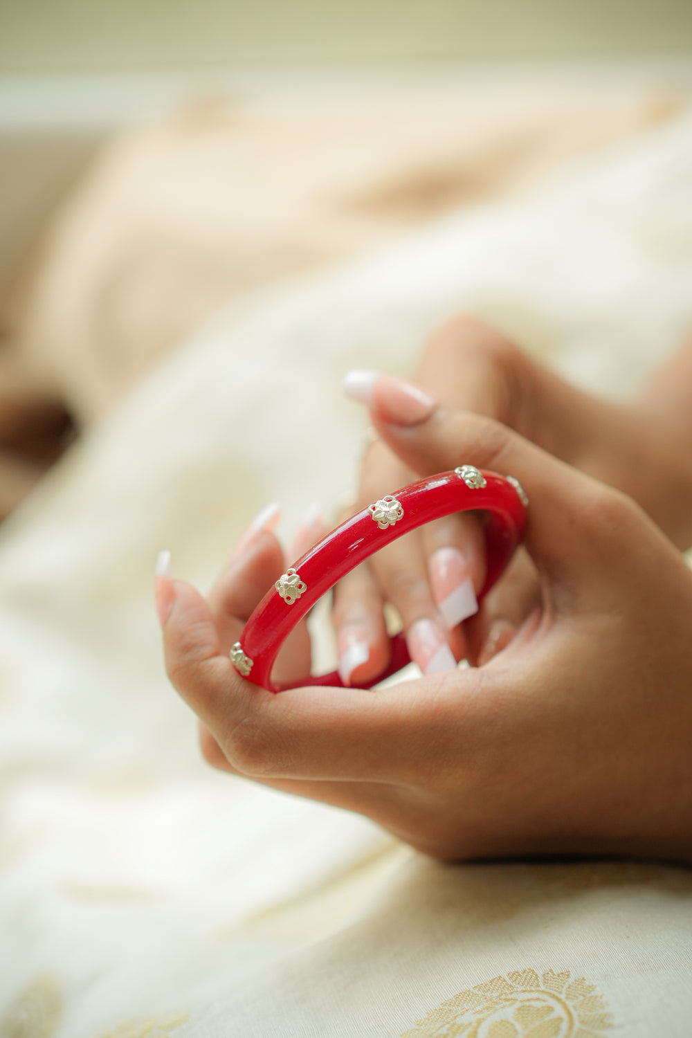 Red Pola Bangle with Silver Floral Accents
