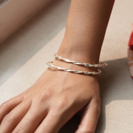 Silver Twisted Bangle in Smooth Polish