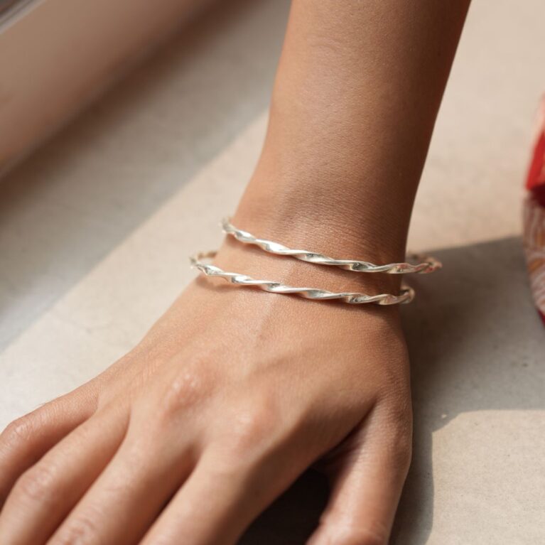 Silver Twisted Bangle in Smooth Polish